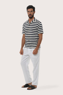 Side profile of the Salur Shirt Stripe in Navy highlighting its easy, breathable fit by By The Sea Bali