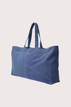 Angled view of the Sarcha Tote Bag emphasizing its elegant proportions and timeless appeal