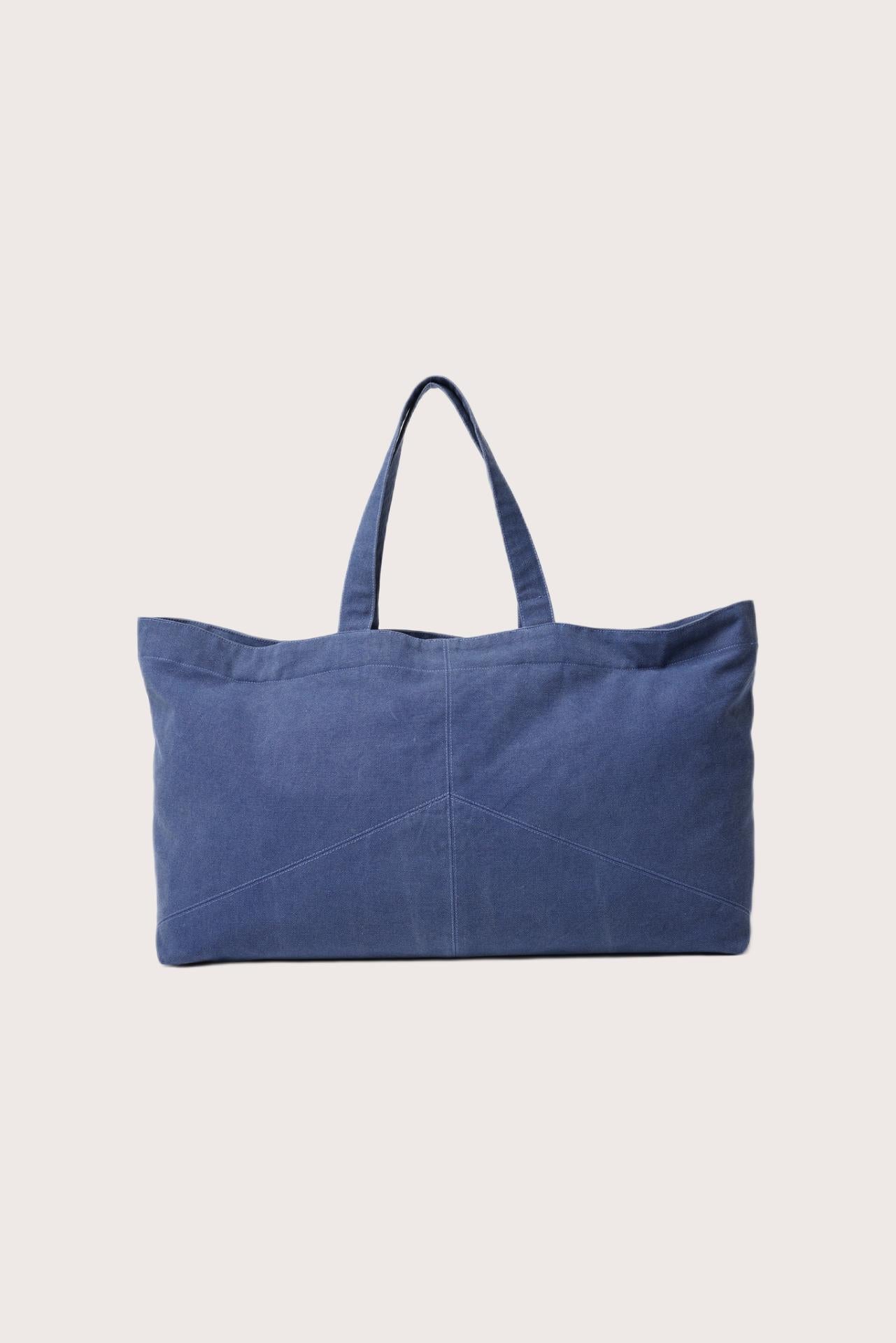 Back view of the Sarcha Tote Bag showcasing its clean lines and artisanal craftsmanship