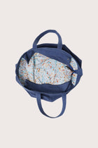 Full view of the Sarcha Tote Bag capturing its spacious design and effortless vacation style