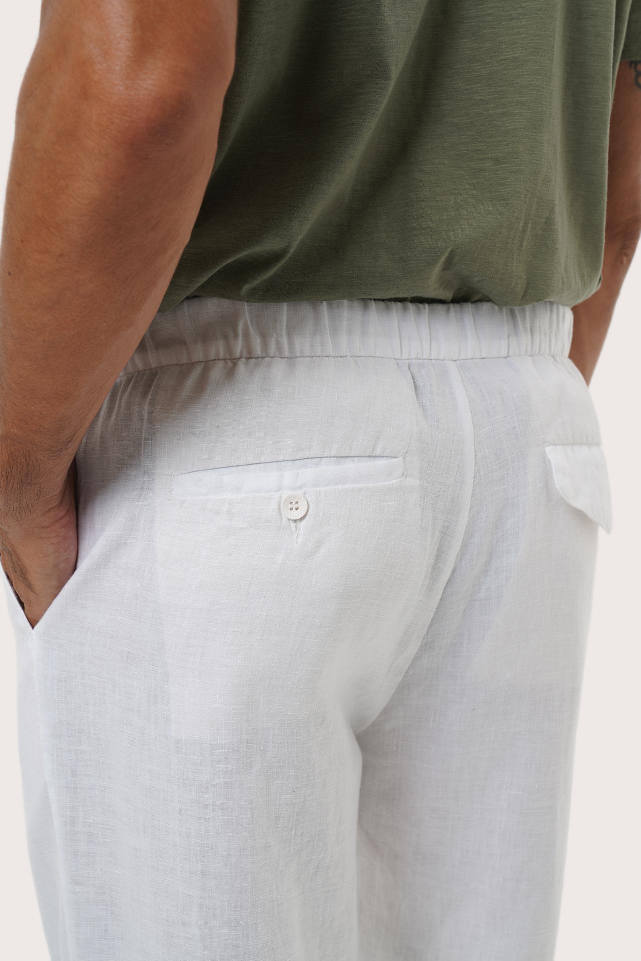 Full-length view of the White Sargi Linen Pant styled for effortless resort dressing by By The Sea Bali
