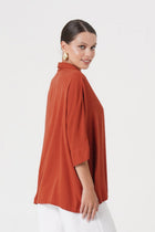 Savanna Earring styled as a sophisticated resort accessory