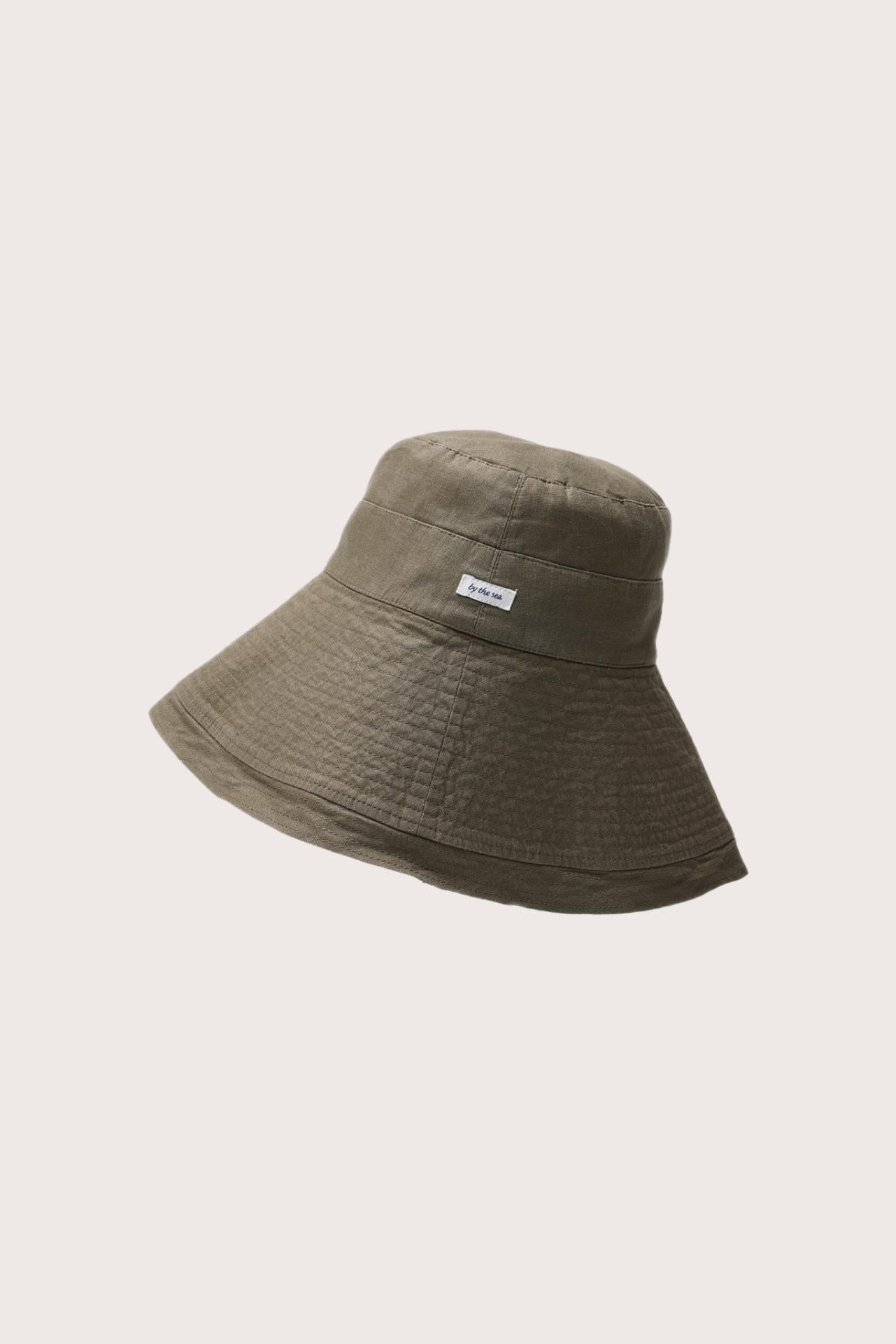 Side view of the Savanna Linen Hat Brown highlighting its soft linen structure and relaxed shape