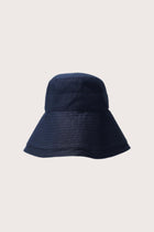 By The Sea Bali Savanna Linen Hat in navy with elegant wide-brim resort silhouette