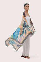 Side view of the Savaya Sarong in the signature Summer Paint print
