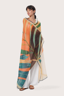 By The Sea Bali Savaya Sarong in Summer Palm Green featuring a tropical palm-inspired print, worn as an elegant wrap silhouette