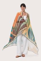 By The Sea Bali Savaya Sarong in Summer Palm Green styled for effortless resort dressing-worn as an elegant wrap silhouette