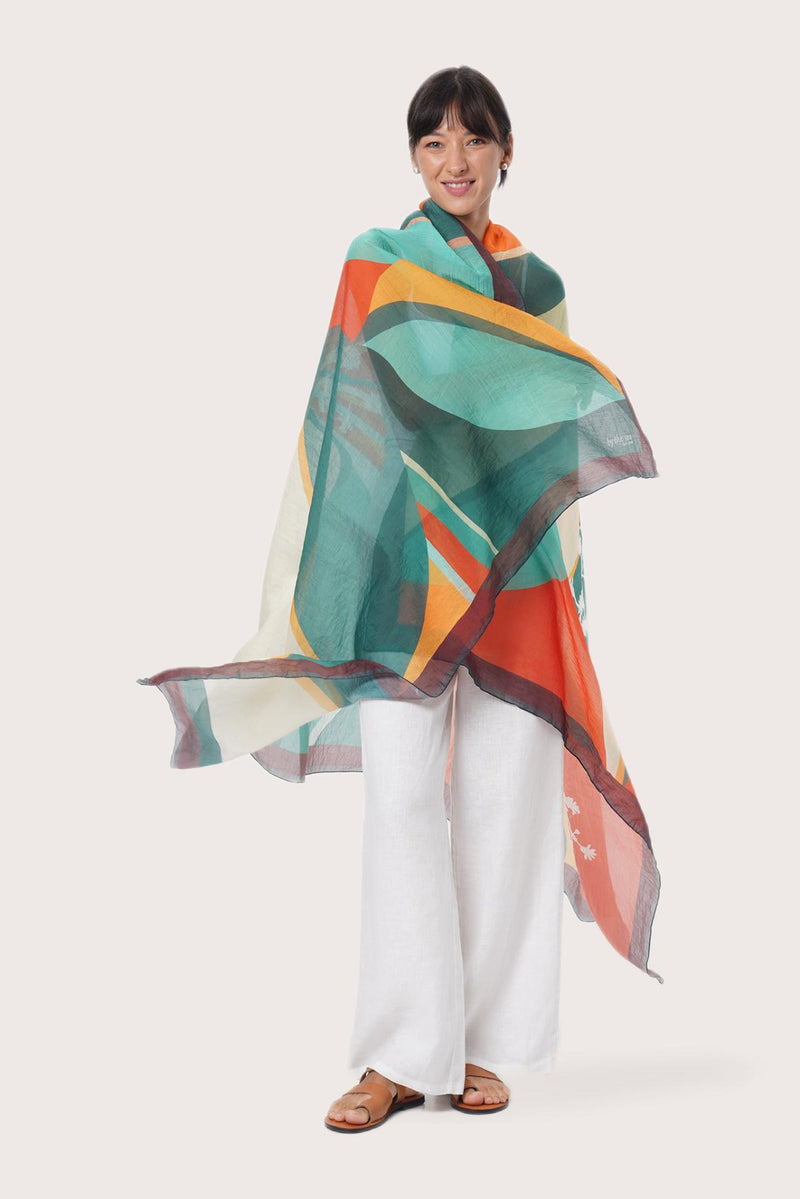 By The Sea Bali Savaya Sarong in Tropical Breath Multicolor worn as an elegant wrap silhouette