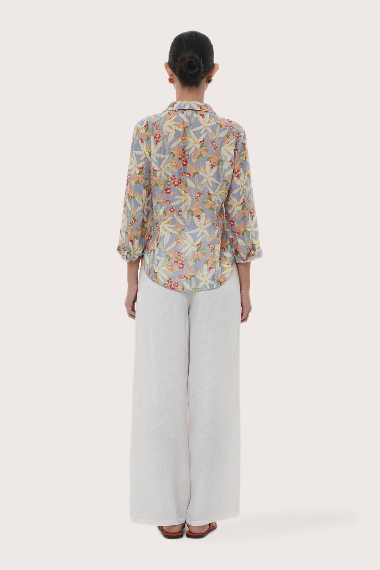 Back view of the Selva Shirt Crisante Multicolor Light Blue Base highlighting the garment shape and drape.