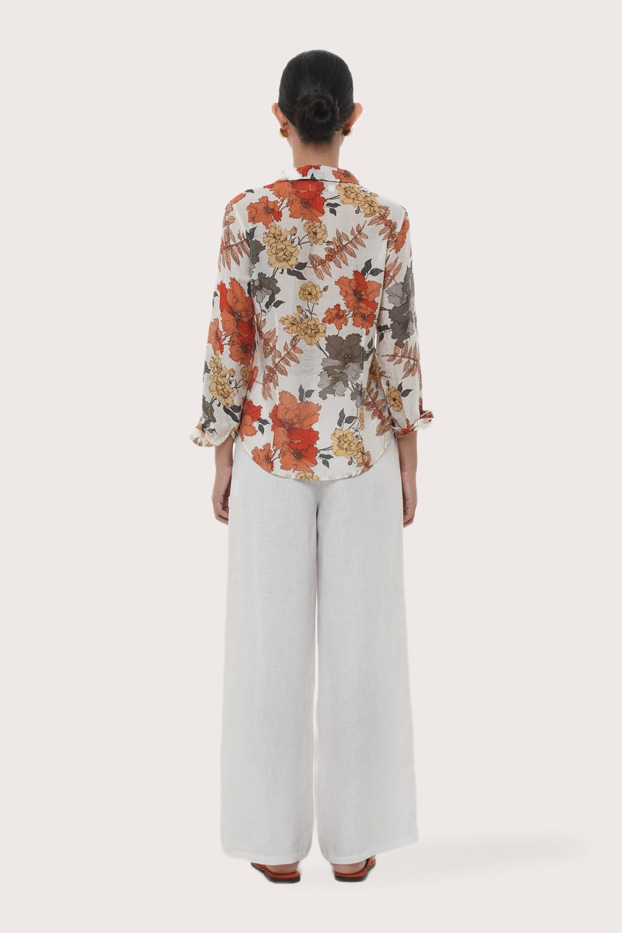 Back view of the Selva Shirt Raya highlighting the garment shape and drape.