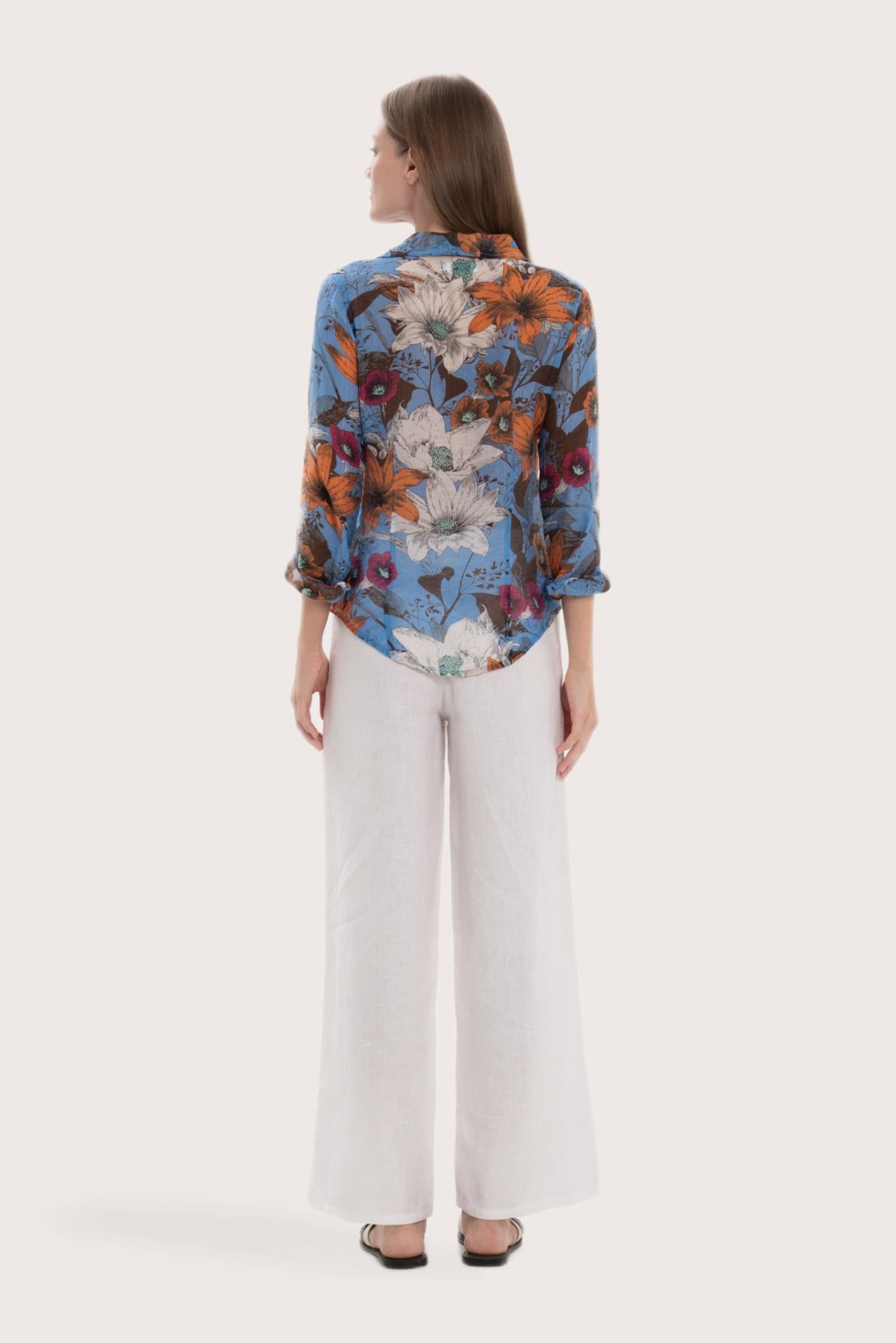 Back view of the navy base multicolor Daisy shirt with a relaxed and elegant silhouette