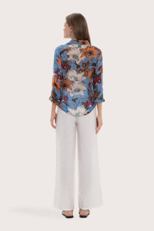Back view of the navy base multicolor Daisy shirt with a relaxed and elegant silhouette