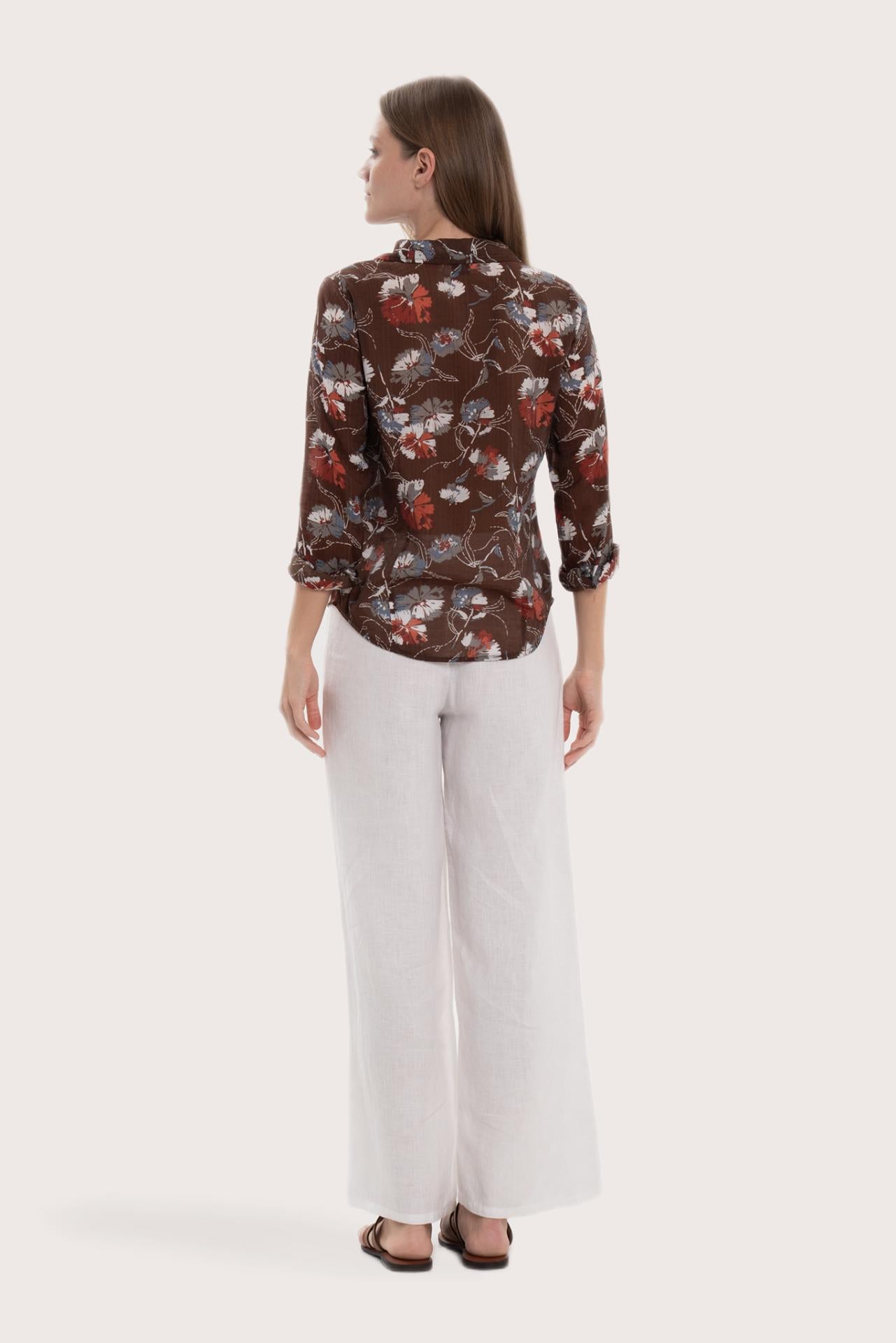 Back view of the brown base multicolor Marigold shirt with a relaxed and elegant silhouette