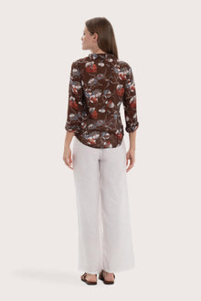 Back view of the brown base multicolor Marigold shirt with a relaxed and elegant silhouette