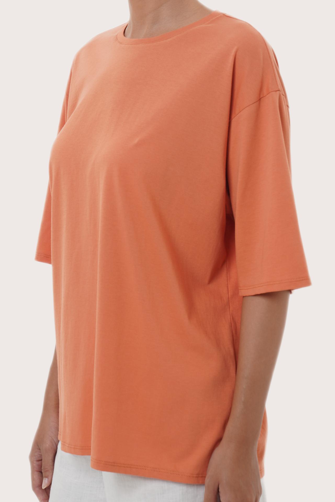By The Sea Bali Refined detail of the Serva Loose T-Shirt in Orange Brick