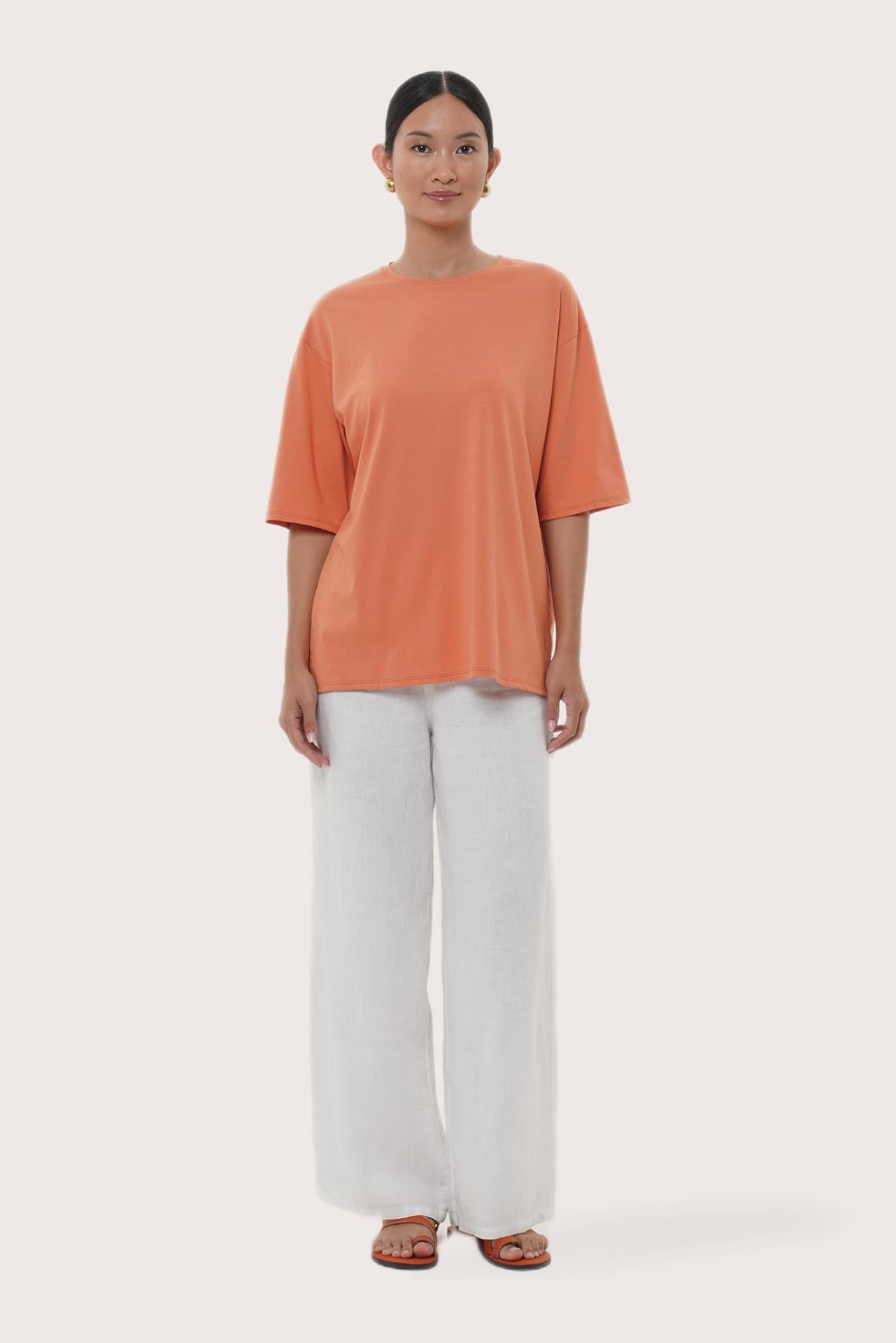 By The Sea Bali Serva Loose T-Shirt in Orange Brick featuring a relaxed silhouette and effortless resort style
