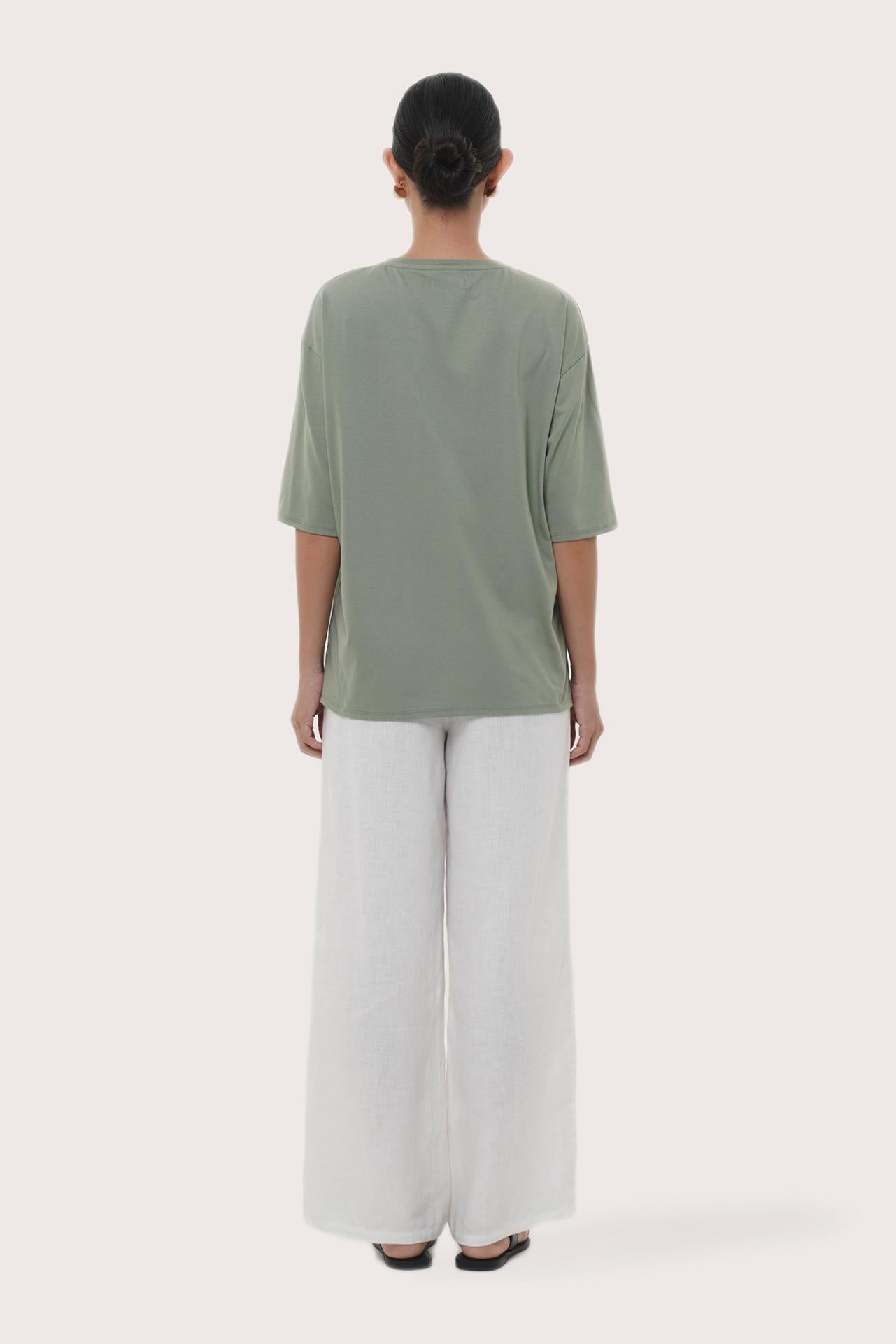 By The Sea Bali Back view of the Serva Loose T-Shirt in Pastel Sage