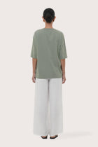 By The Sea Bali Back view of the Serva Loose T-Shirt in Pastel Sage