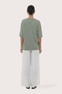 By The Sea Bali Back view of the Serva Loose T-Shirt in Pastel Sage