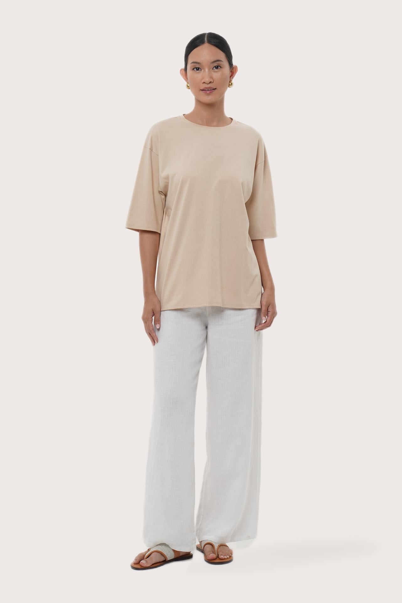 By The Sea Bali Serva Loose T-Shirt in Pastel Yellow featuring a relaxed silhouette and effortless resort style