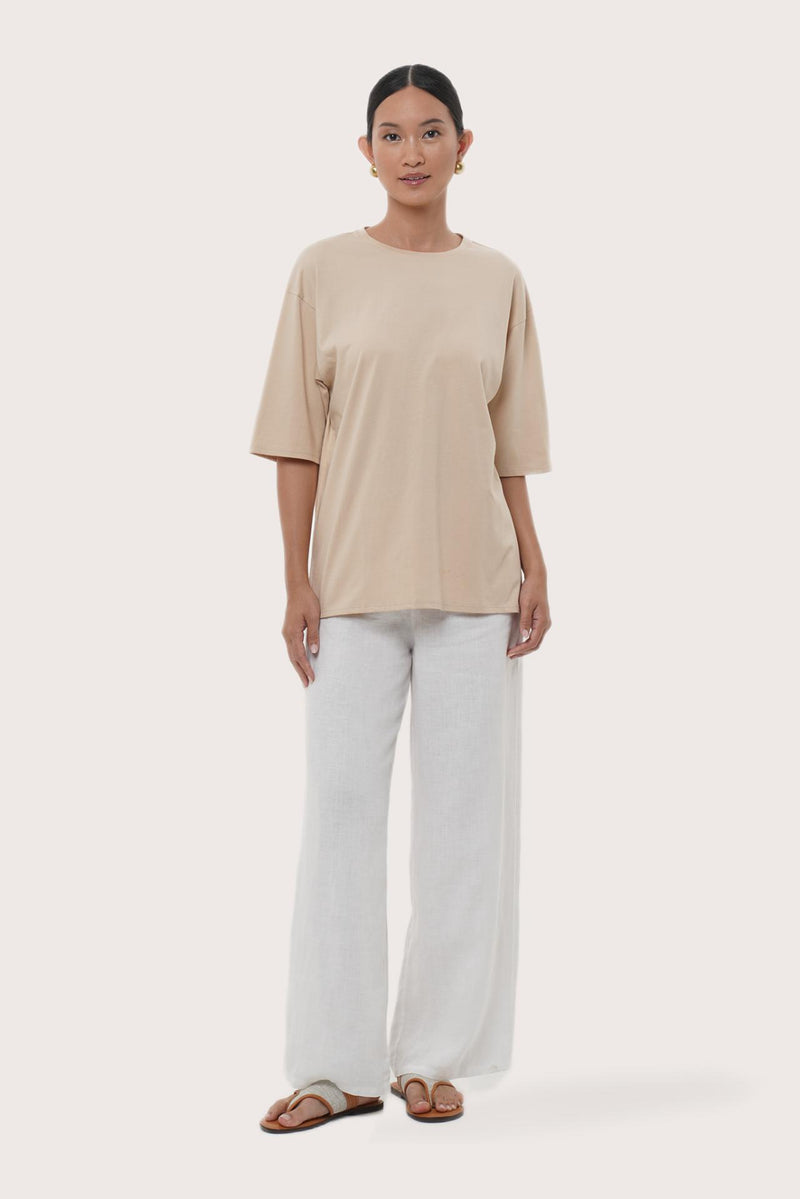 By The Sea Bali Serva Loose T-Shirt in Pastel Yellow featuring a relaxed silhouette and effortless resort style