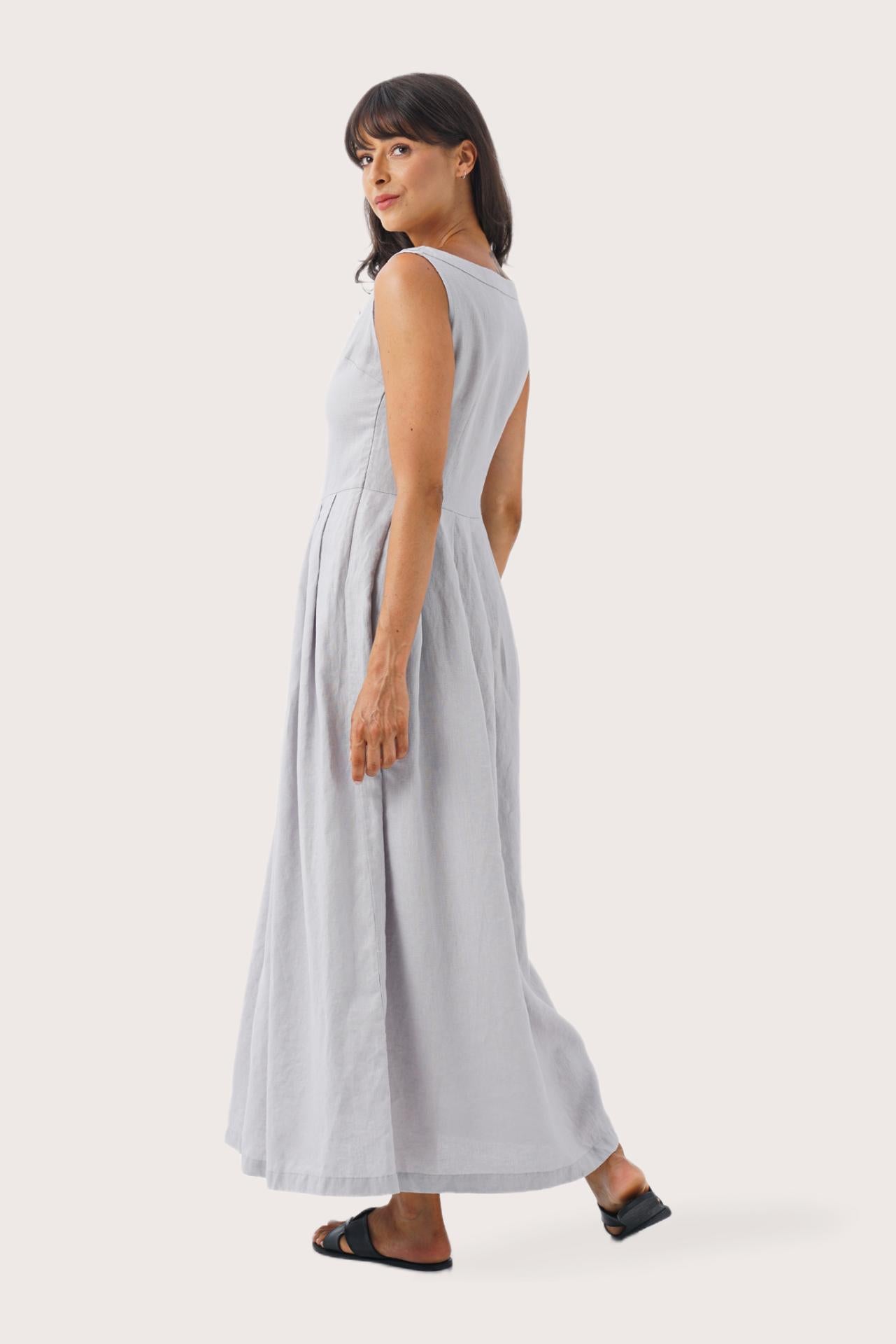 Back view of the Shino Maxi Dress Light Grey highlighting the garment shape and drape