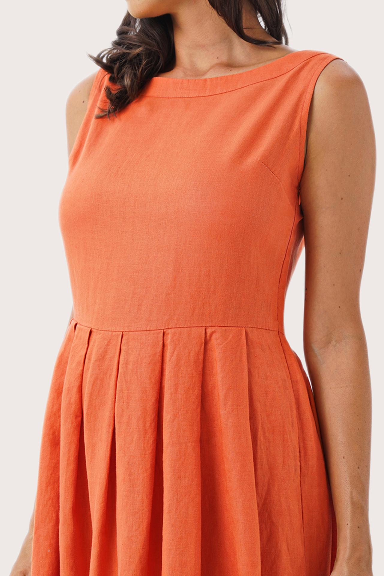 Close up detail of the Shino Maxi Dress Orange highlighting craftsmanship and design features