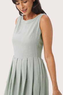 Close up detail of the Shino Maxi Dress Sage highlighting craftsmanship and design features