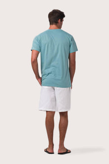 Back view of the By The Sea Bali Skala Surf Canggu t-shirt Turquoise – clean tailoring and refined craftsmanship