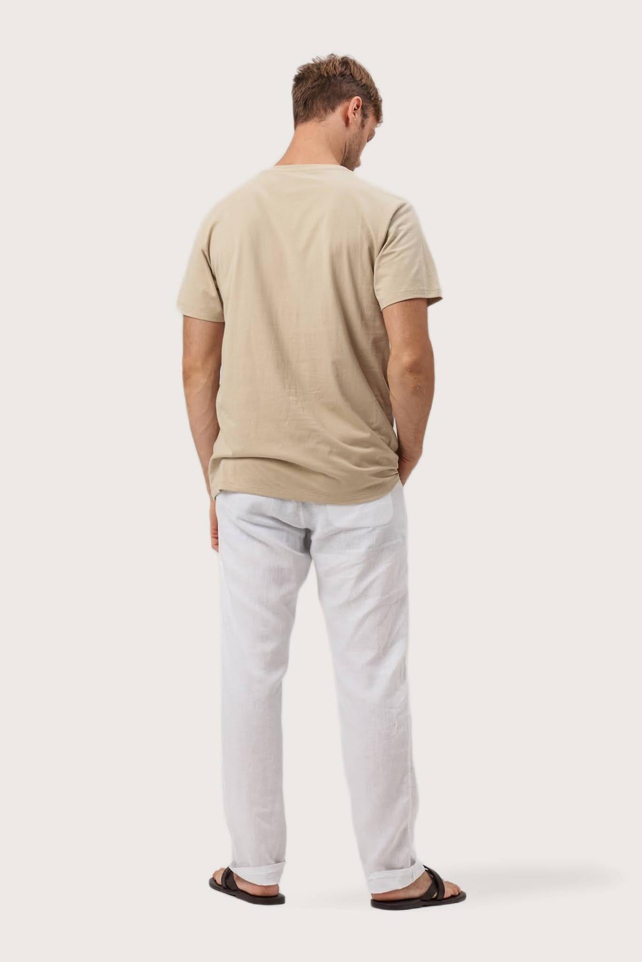 Back view of the By The Sea Bali Skala T-Shirt Beige – clean tailoring and refined craftsmanship