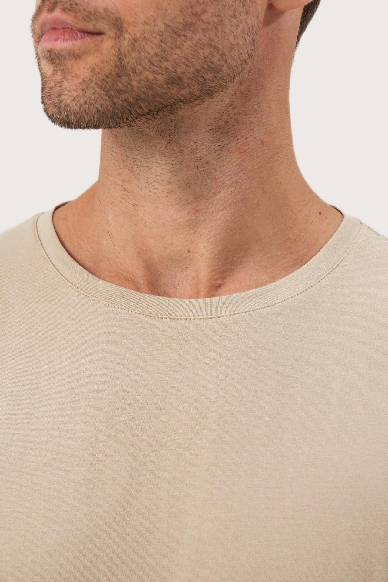 Close-up of the Skala T-Shirt Beige by By The Sea Bali – exceptional fabric quality and texture