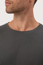 Close-up of the Skala T-Shirt Cenere by By The Sea Bali – exceptional fabric quality and texture