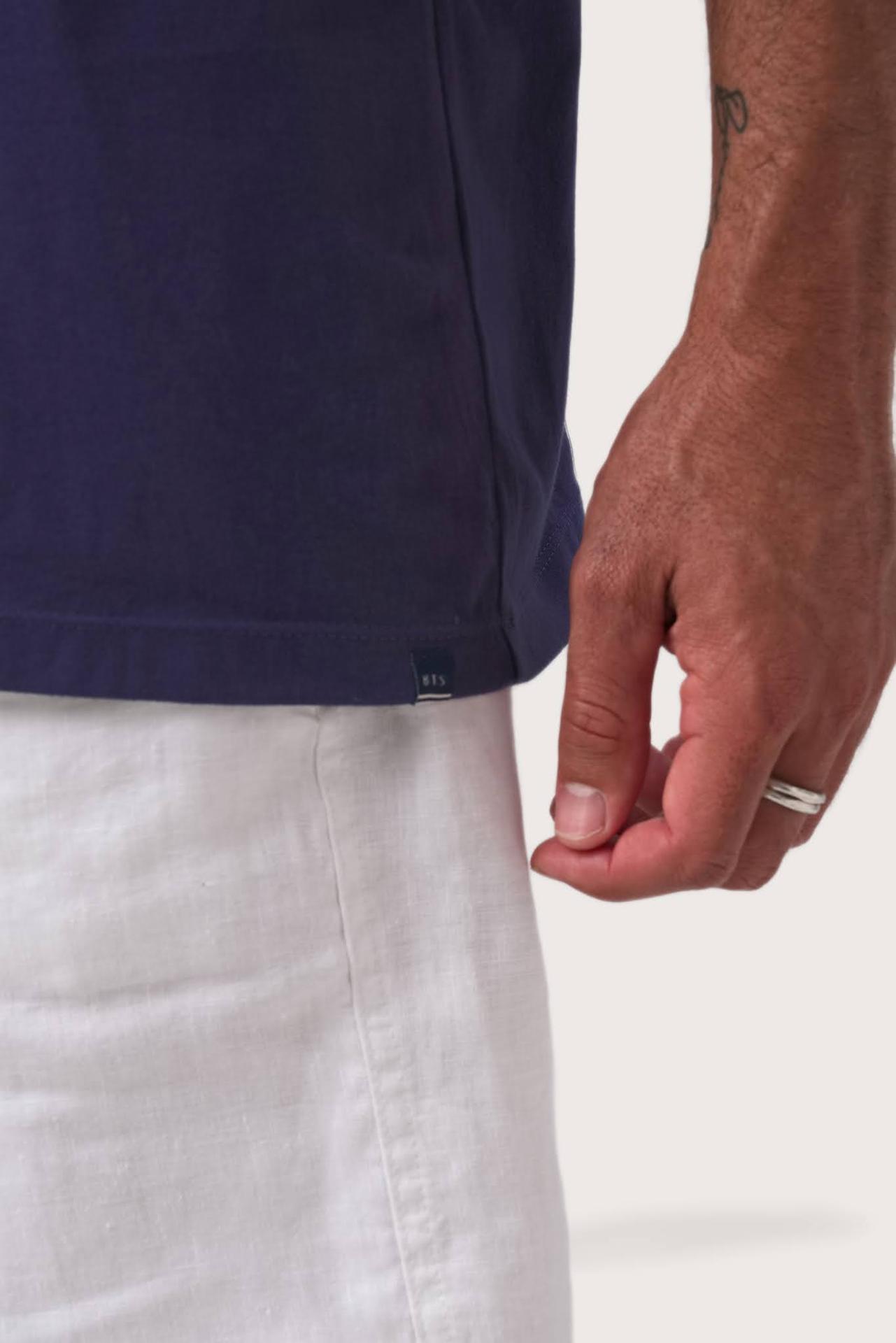 Angled detail of the Skala T-Shirt Dark Purple by By The Sea Bali – refined craftsmanship up close