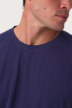 Close-up of the Skala T-Shirt Dark Purple by By The Sea Bali – exceptional fabric quality and texture