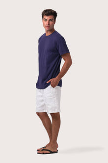 Side profile of the Skala T-Shirt Dark Purple by By The Sea Bali – relaxed drape and understated island elegance