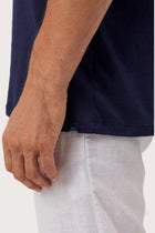 Angled detail of the Skala T-Shirt Les Bleus by By The Sea Bali – refined craftsmanship up close