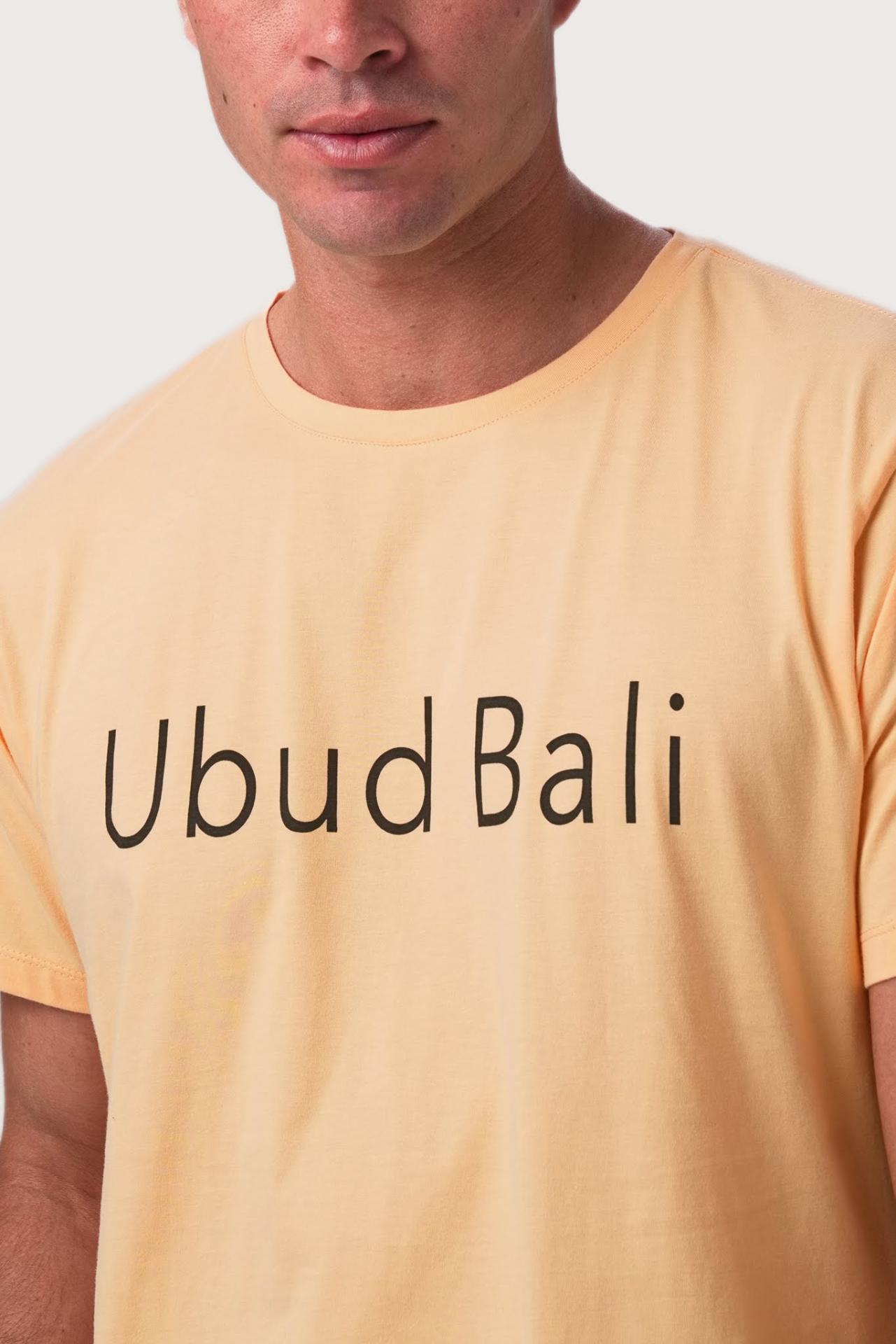 Close-up of the Skala Ubud t-shirt Peach by By The Sea Bali – exceptional fabric quality and texture