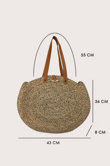 Straw round bag shown with dimension reference highlighting size, scale, and proportions