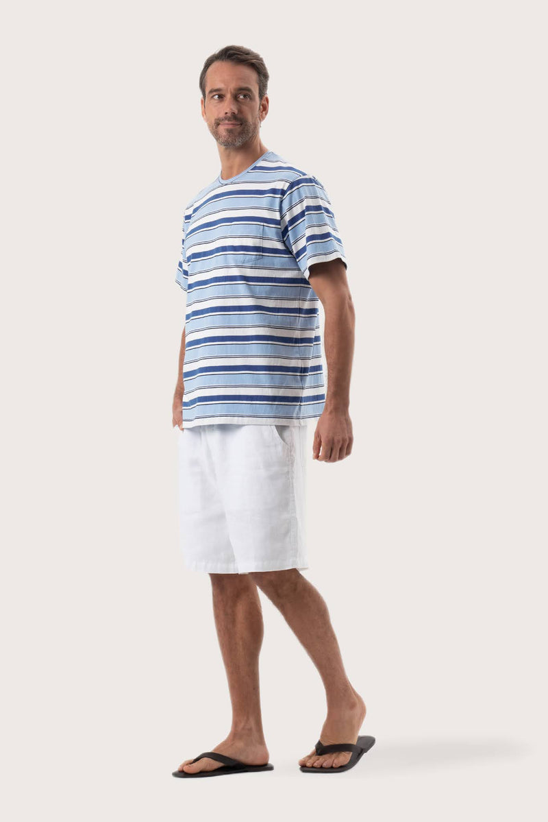 Side profile of the Striped cotton T-shirt Blue Mix by By The Sea Bali – relaxed drape and understated island elegance