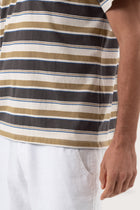 Angled detail of the Striped cotton T-shirt Brown Mix by By The Sea Bali – refined craftsmanship up close