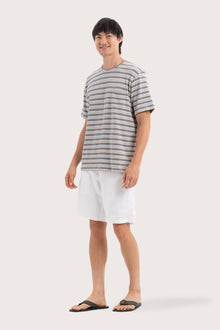 Side profile of the Striped Cotton T-shirt Grey Mix by By The Sea Bali – relaxed drape and understated island elegance