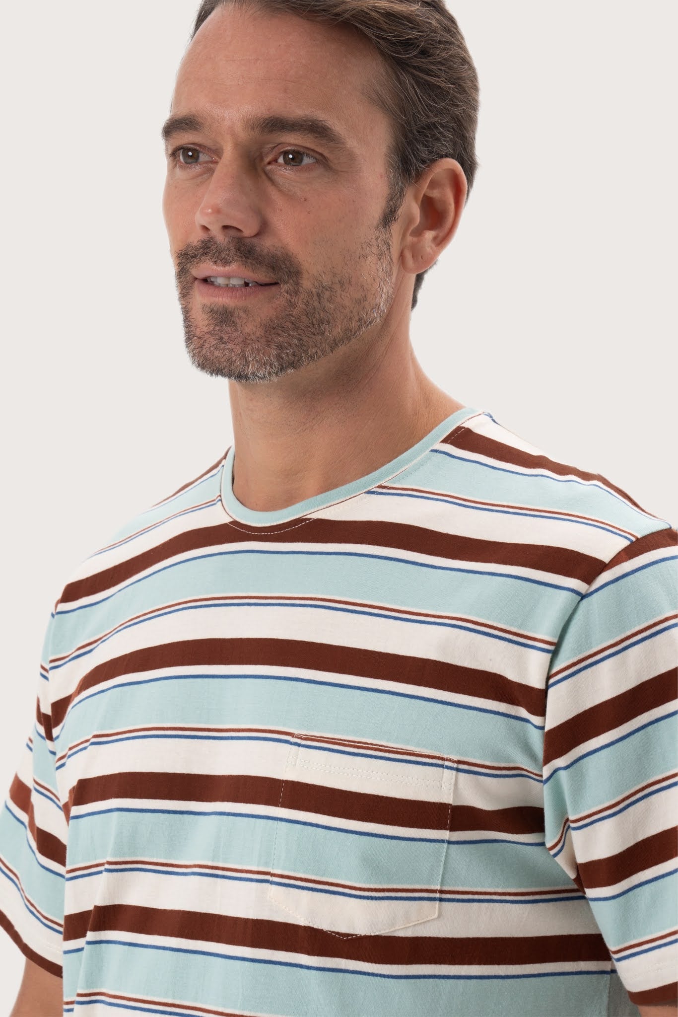 Angled detail of the Striped cotton T-shirt Mint Mix by By The Sea Bali – refined craftsmanship up close