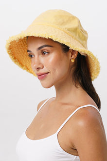 Sunday Bucket Hat in Yellow with a relaxed resort-inspired silhouette