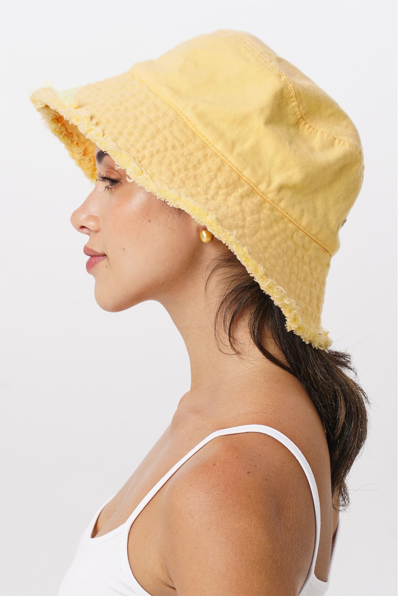 Classic yellow bucket hat with effortless resort-inspired appeal