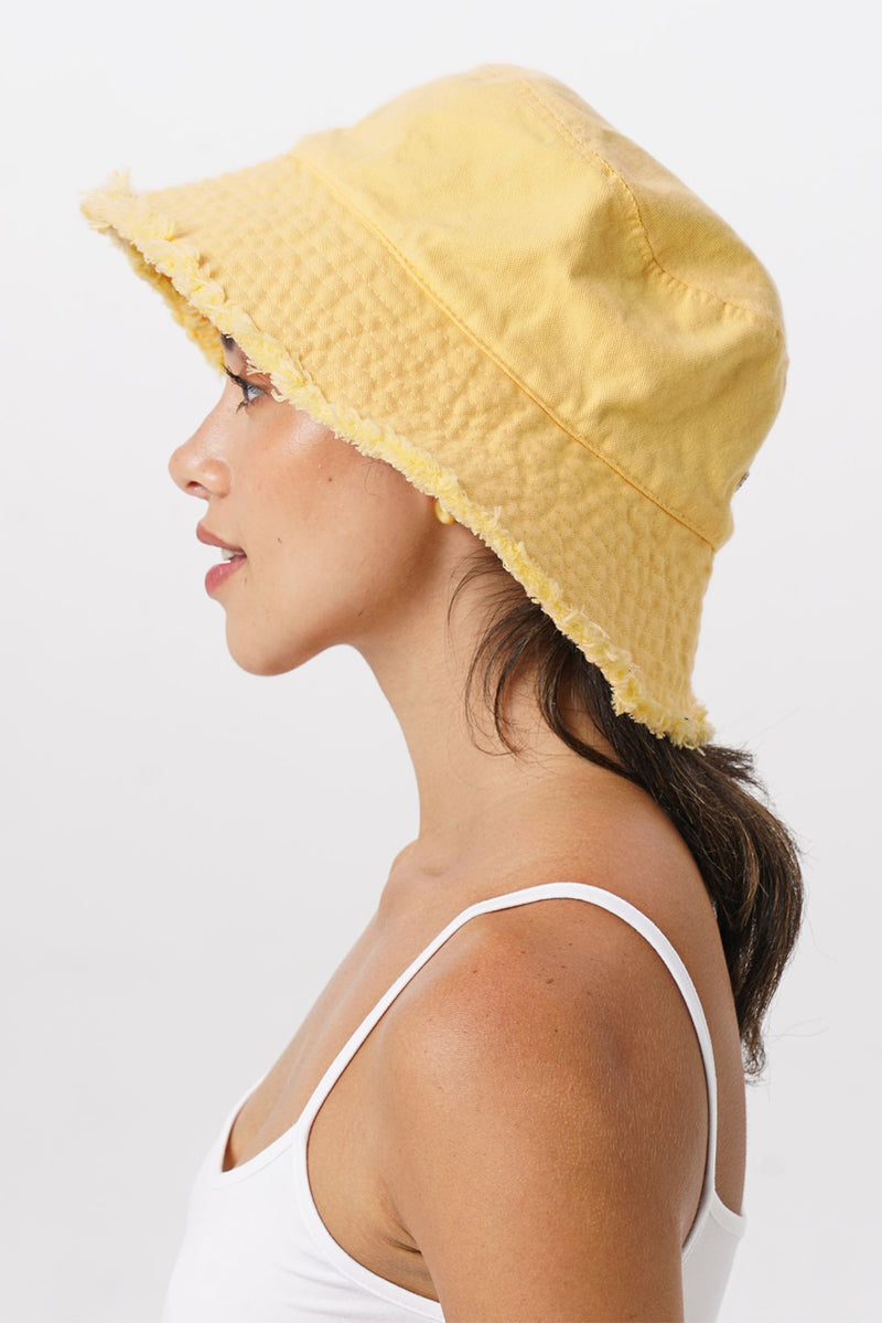 Side view of Sunday Bucket Hat Yellow with a relaxed and versatile shape