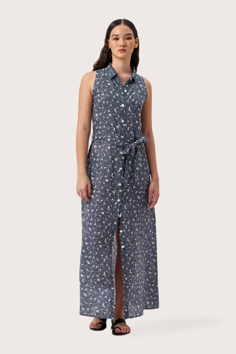 Woman wearing the Sunniva Maxi Linen Dress Sari Gris designed for effortless resortwear and tropical living by By The sea Bali