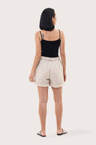Back view of the Taloo Linen Bermuda Creme highlighting the garment shape and drape