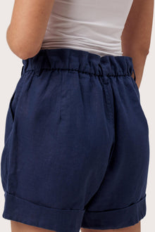 Close up detail of the Taloo Linen Bermuda La Brisa Navy highlighting craftsmanship and design features