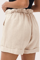 Close up detail of the Taloo Linen Bermuda Crema highlighting craftsmanship and design features