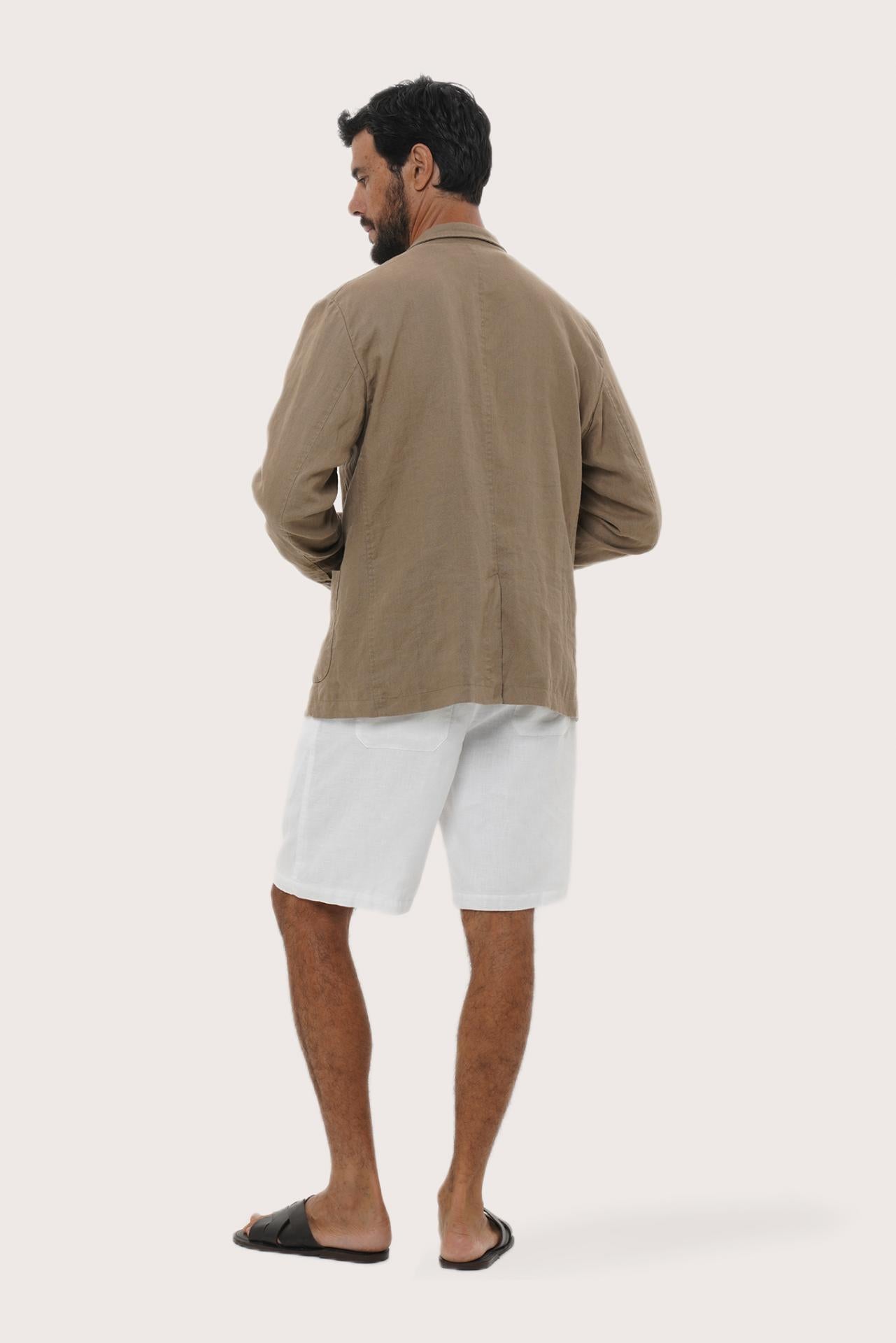 Back view of the brown linen blazer with a relaxed and sophisticated silhouette